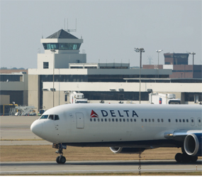 A Delta Air Lines jet lands at Cincinnati/ Northern Kentucky International Airport in this March 2012 file photo.