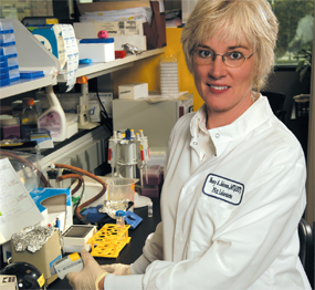 Nancy Johnson, senior medical technologist, pipettes samples for testing at PGxl Laboratories, a pharmacogenetics testing lab in Louisville.