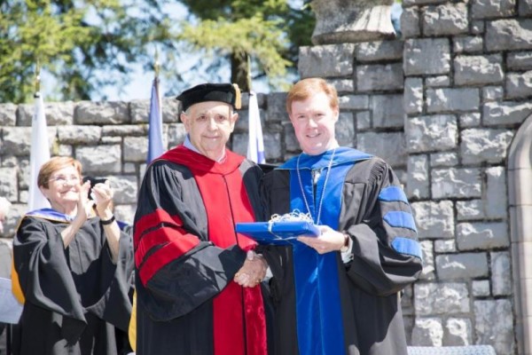 Midway University President Dr. John P. Marsden (right) announced that the institution's Board of Trustees had voted unanimously to confer emeritus status upon Dr. William Brown.
