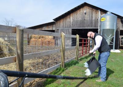 Johnson County farmer Tyler Ferguson hung a black vulture effigy on an old basketball goal post. 