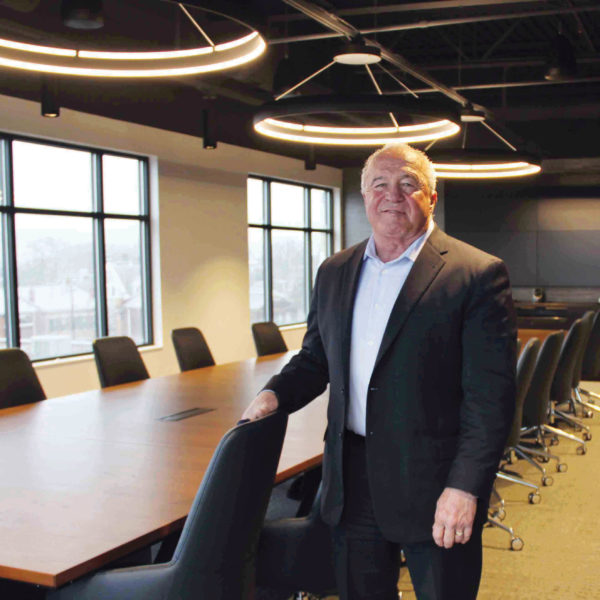 In December 2021, DBL Law moved into its new headquarters, the refurbished Monarch Building in downtown Covington. The $11.3 million construction project began in the fall of 2020. Managing partner Bob Hoffer, shown here in one of the firm’s conference rooms, said the building is a bridge to connect DBL with its history; the firm started in Covington more than 60 years ago but moved to Crestview Hills in 1983. 