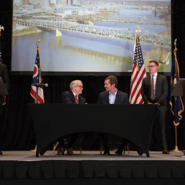 Kentucky Gov. Andy Beshear and Ohio Gov. Mike DeWine said they will jointly pursue up to $2 billion in federal funding to drastically reduce traffic congestion on and around the Brent Spence Bridge.