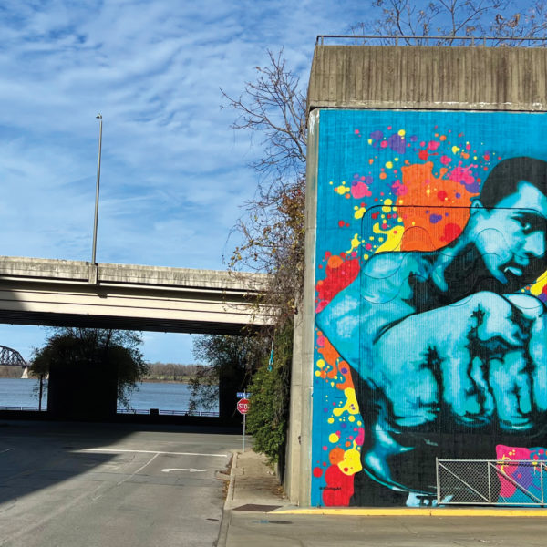 This mural of Muhammad Ali by social change artist and muralist Ashley Cathey is located across the street from the Muhammad Ali Center in downtown Louisville. It is one of the city’s many murals of the heavyweight champion who grew up in Louisville’s West End.
