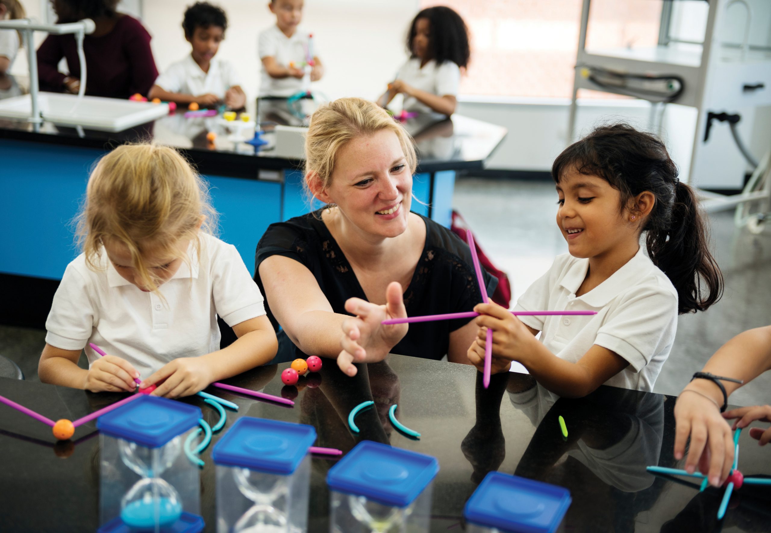 Teaching practice. Kindergarten Fit Сток фото. Pupils holding Toys. Flexibility in teaching. Фото держу сад и 2 школы.